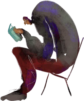 man reading in chair